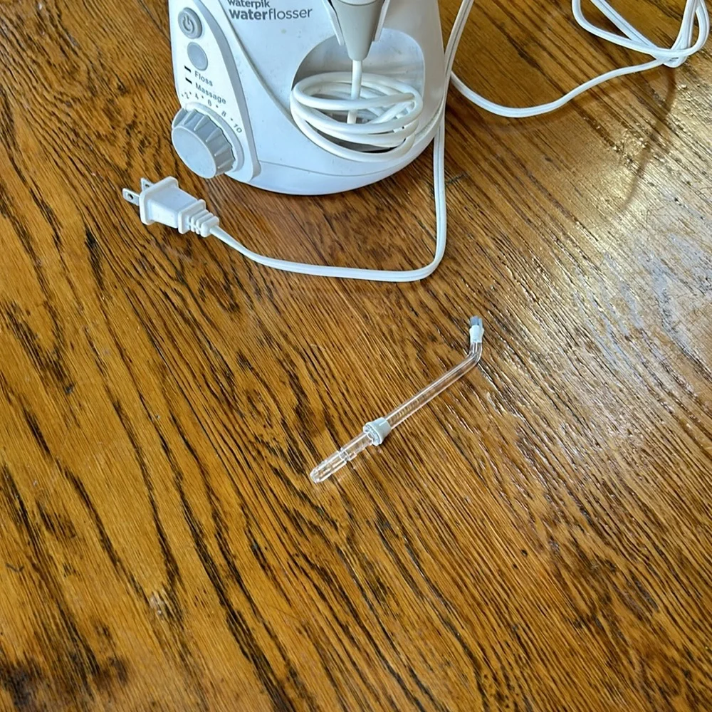 Waterpik brand water flosser. Used but great condition. No personal attachments